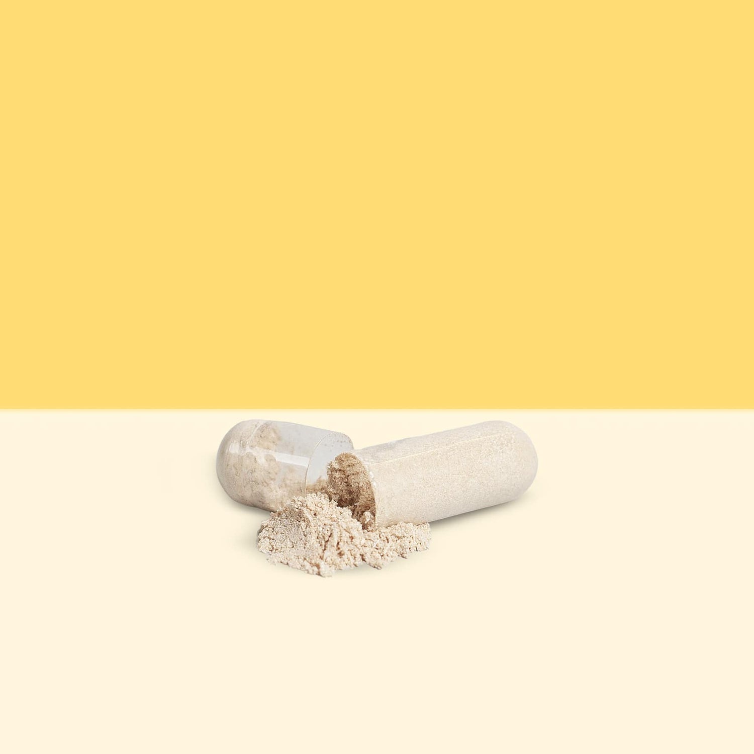 Locked In Limitless open pill on cream colored surface against a gold background.